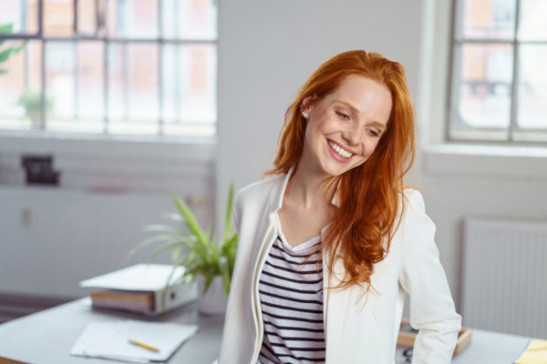 Red haired woman.