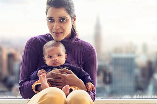 Woman holding her nephew.