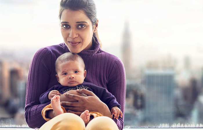 Woman holding her nephew.