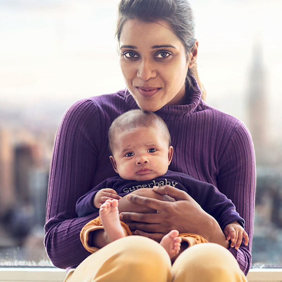 Woman holding her nephew.