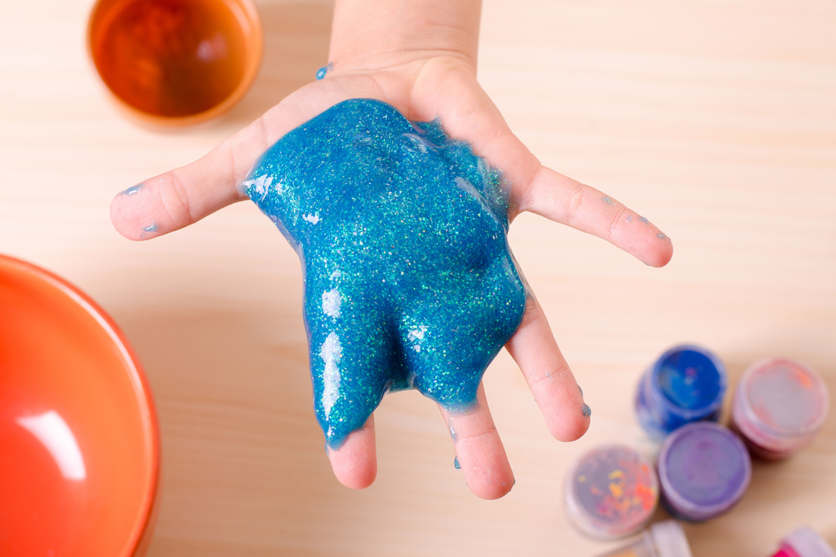 Kids making slime during a science birthday party at The Tech Interactive