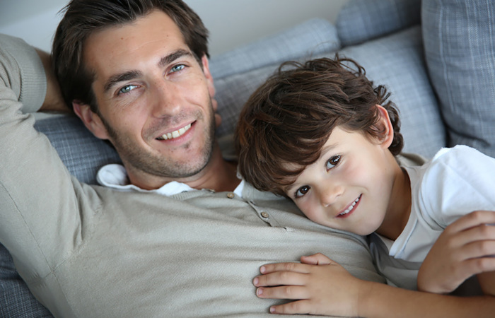 Brown eyed child with father.