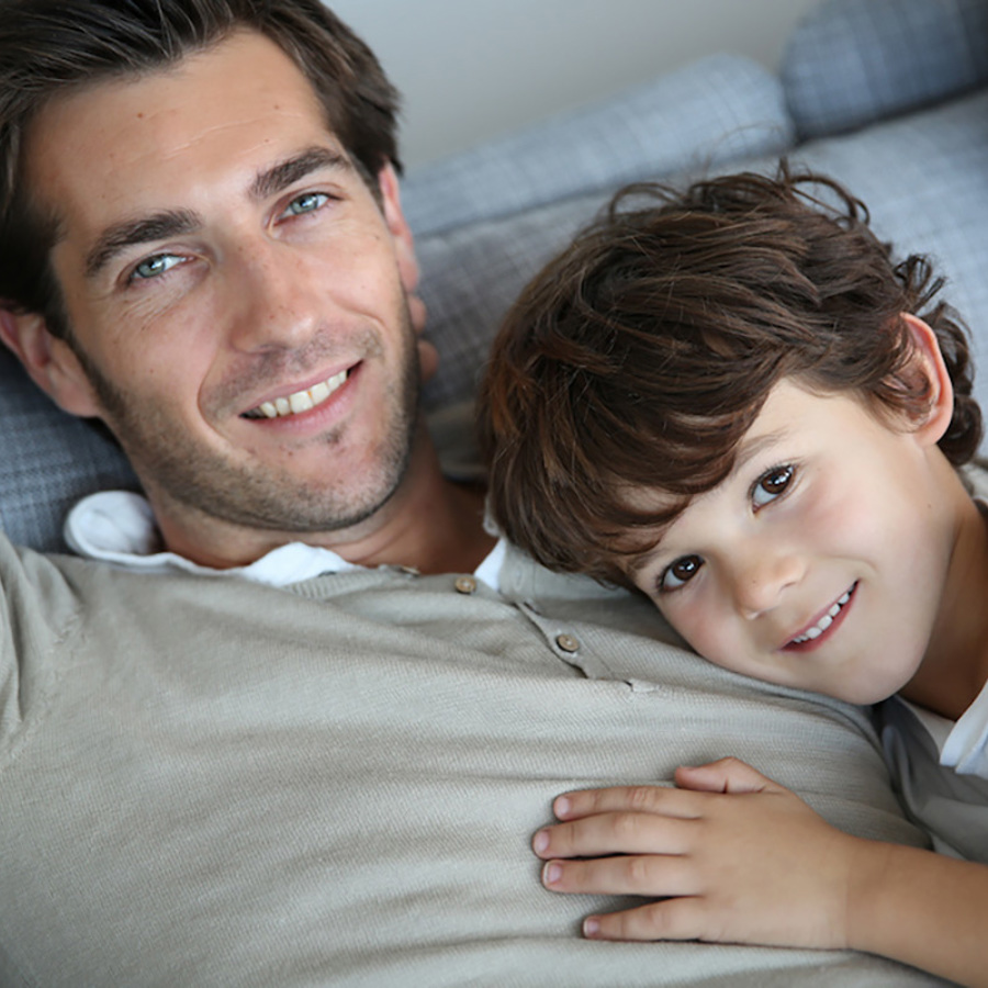 Brown eyed child with father.