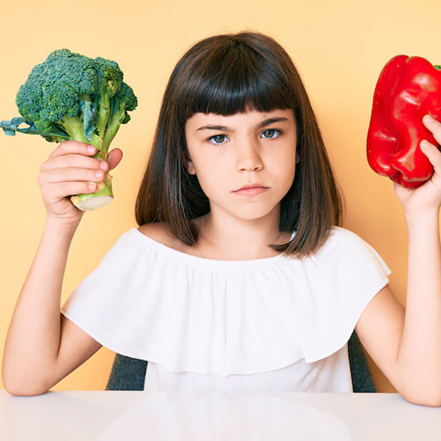 Girl with vegetables.