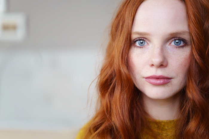 Woman with red hair.