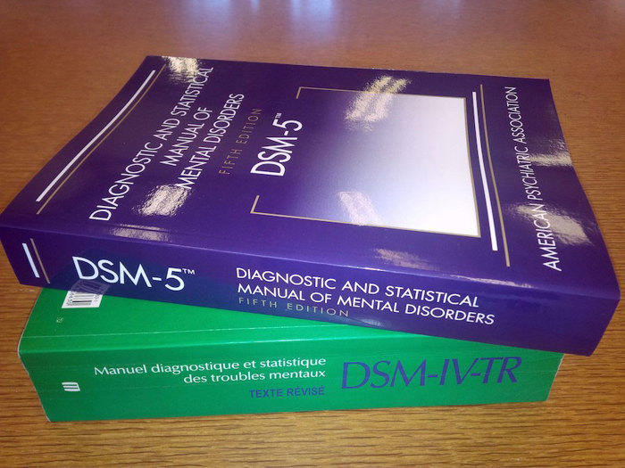 Diagnostic and Statistical Manual (DSM) books.