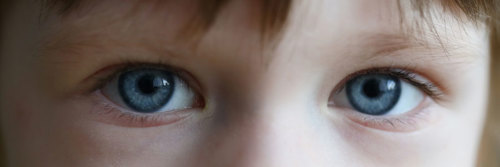 Child with blue eyes.