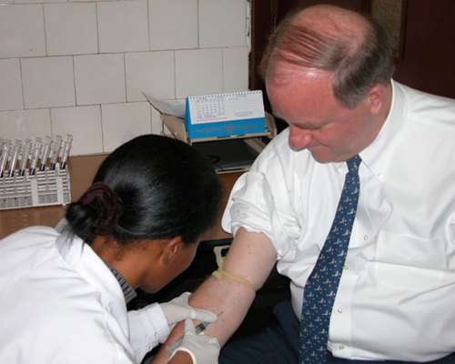 Man getting his blood drawn.