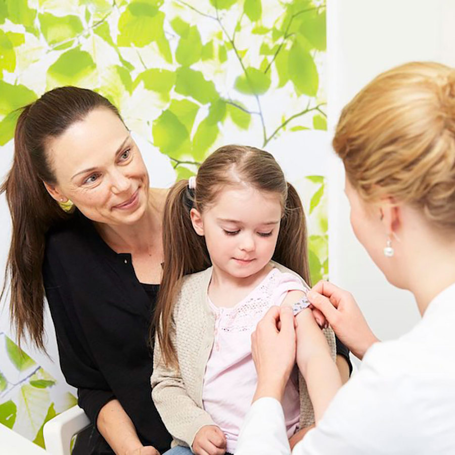 Child getting vaccine.