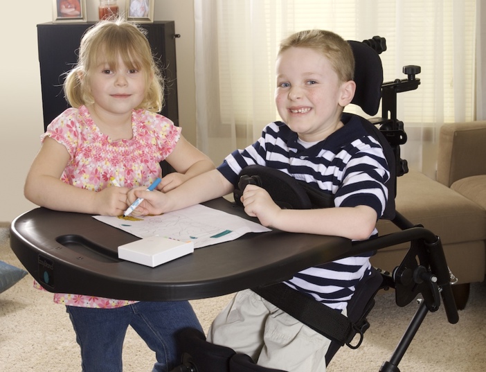 Boy in wheelchair.