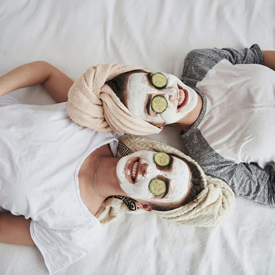 Twin sisters gettings facials.