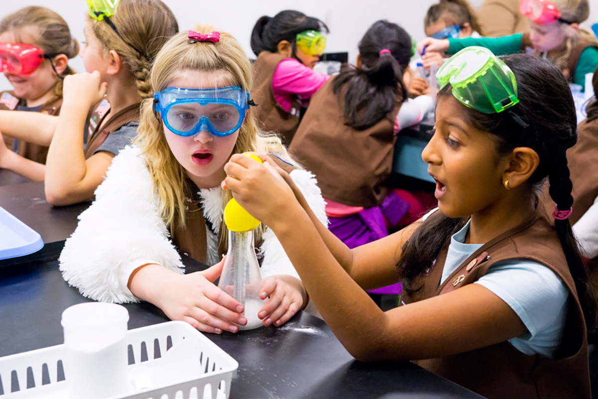 Girl Scout Brownies participating in the Home Scientist Badge program.