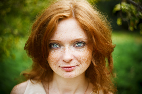 Girl with red hair and blue eyes