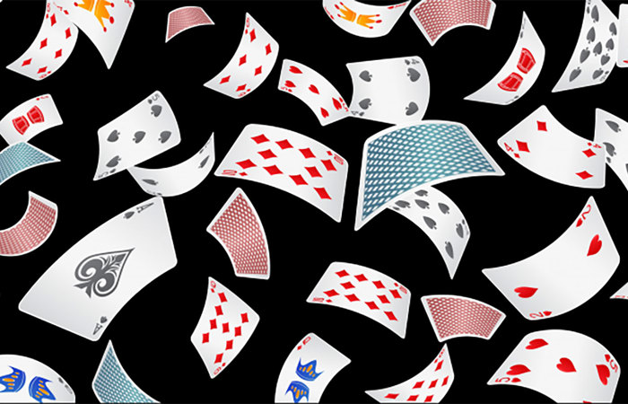 Poker cards scattered.