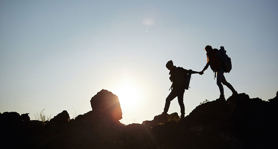 Silhouetted couple.