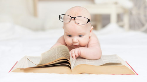 Baby in glasses.