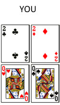 Four playing cards.