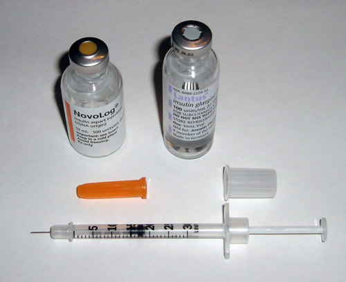 Insulin and syringe.
