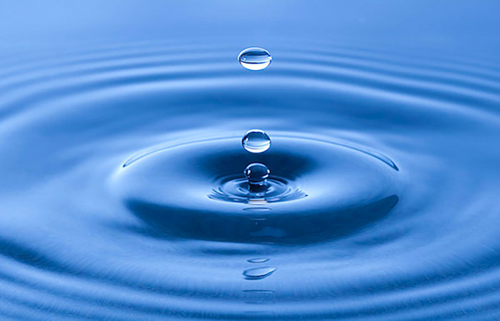 Water drop with ripples.
