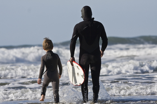 Father and child at a beach