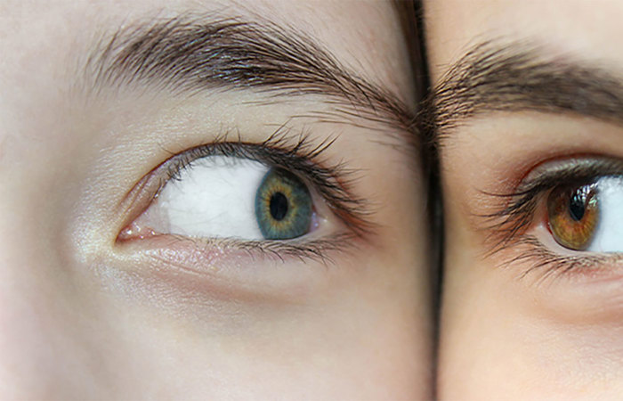 Two female faces next to each other.