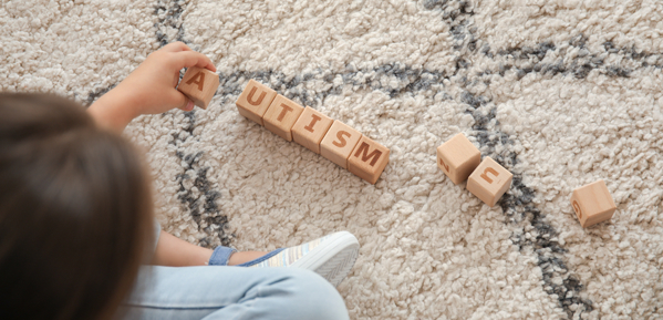Alphabet blocks spelling 'autism'