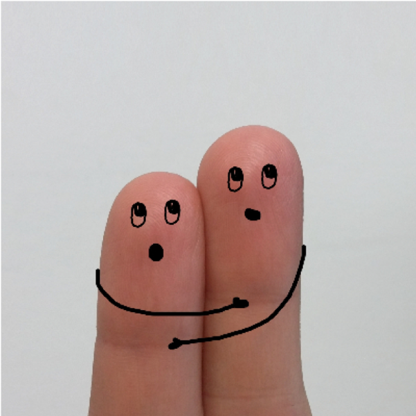 Two fingers with anxious-looking faces.