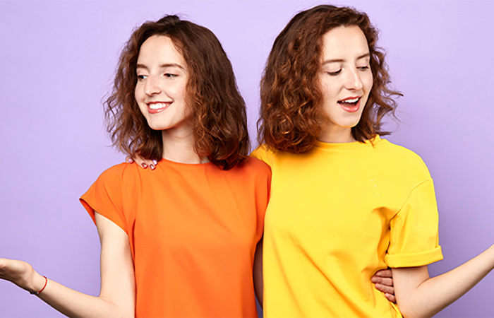 Identical twin sisters.