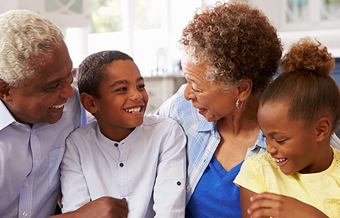 Grandparents with their young grandchildren.