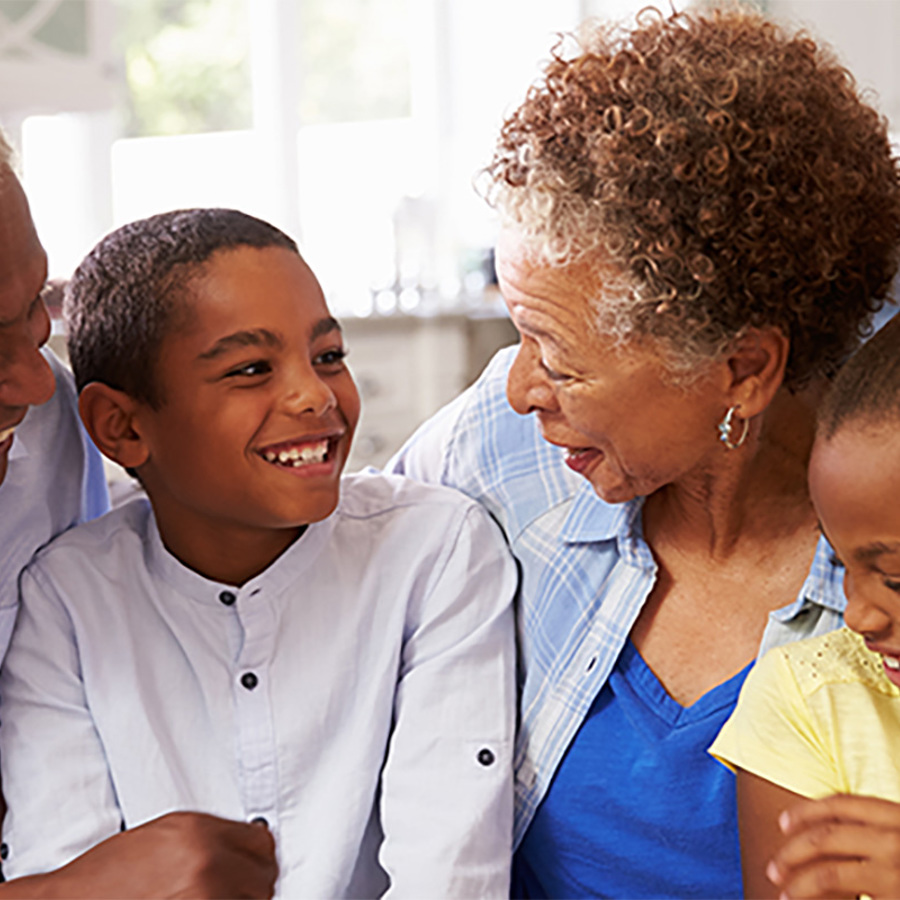 Grandparents with their young grandchildren.