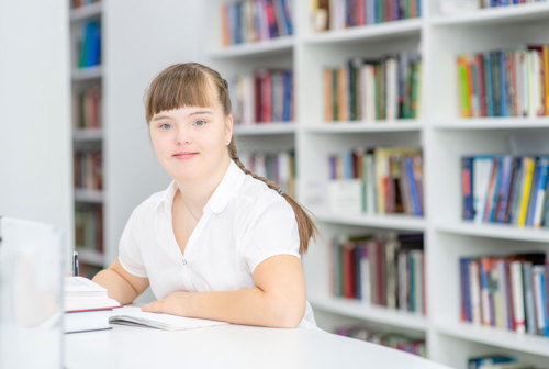 A young woman with Down Syndrome.