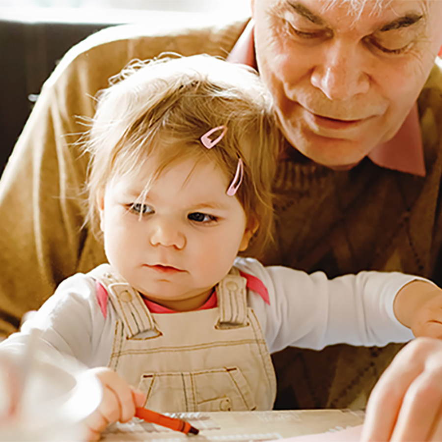 Grandparent and grandchild bonding together.