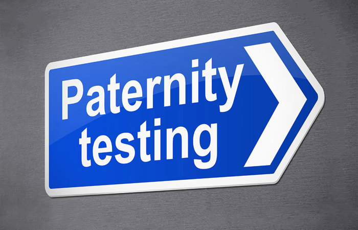Blue paternity test sign.