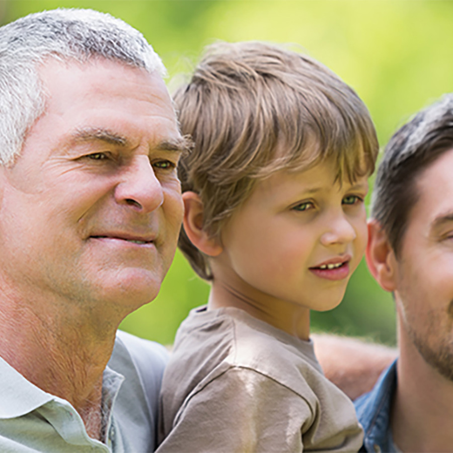 Grandfather, father, and son spending time together.